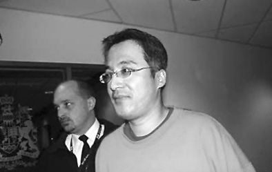 原中行河松街支行行长高山挪用公款8亿外逃获刑15年