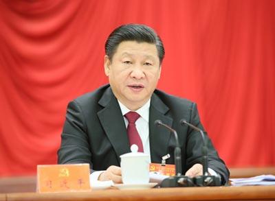 图为:中国共产党第十八届中央委员会第五次全体会议上,中央委员会总书记习近平作重要讲话。