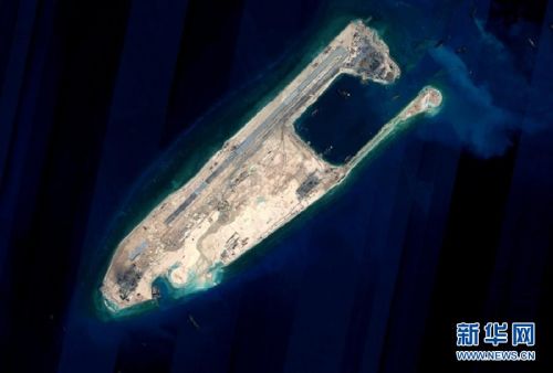 中国官方发布永暑礁完成陆域吹填工程后卫星图片。（新华网）