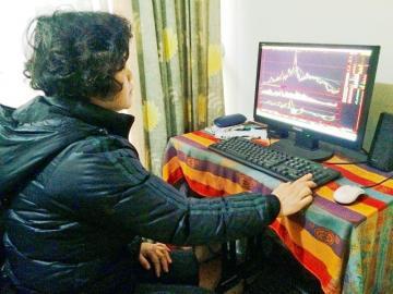 周林芳说，采访当天她又有两支股票涨停了。