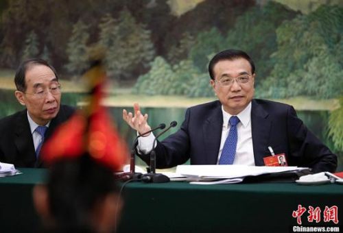 3月7日，中共中央政治局常委、国务院总理李克强参加十二届全国人大四次会议福建代表团的审议。中新社记者 刘震 摄