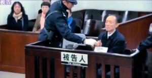 资料图：深圳市政府原秘书长、南方科技大学原副书记李平昨在广州中院受审。