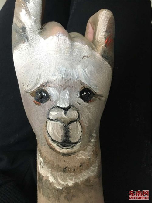 闽江学院美术学院学子手上画出动物世界 作品