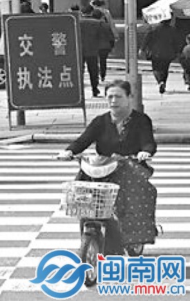 违法人邹×洁