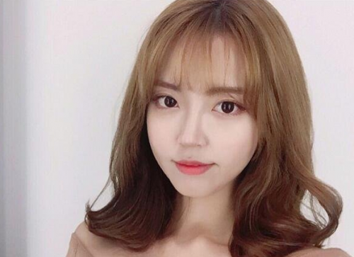 半熟气质发型图片 中长卷发选哪一款-闽南网