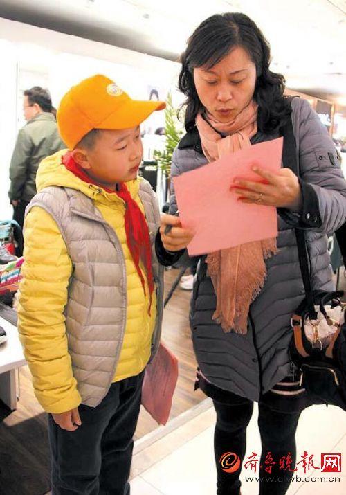 济南小学生街头调查共享单车 八成受访者骑过