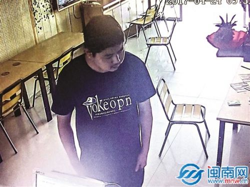 打人男子被监控拍下