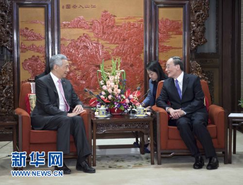 张德江、王岐山在北京分别会见新加坡总理李显龙
