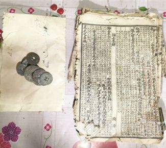 漳州平和霞寨镇：挖出一本古书和十几枚铜钱