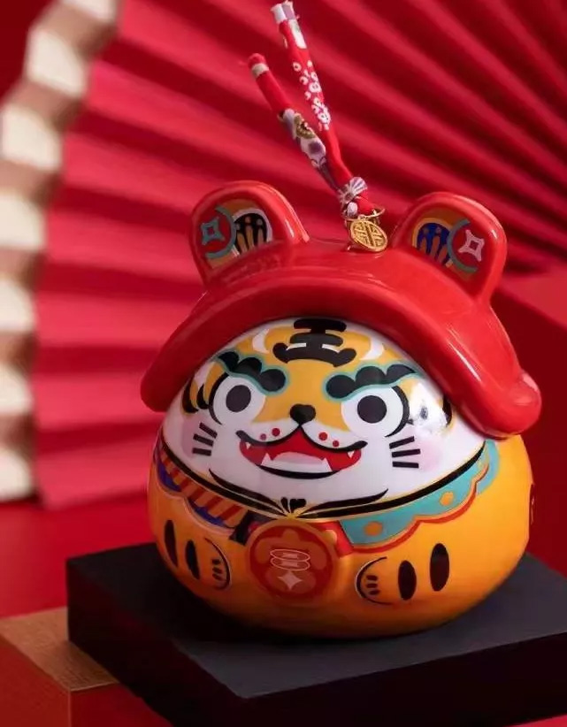 虎抱钱