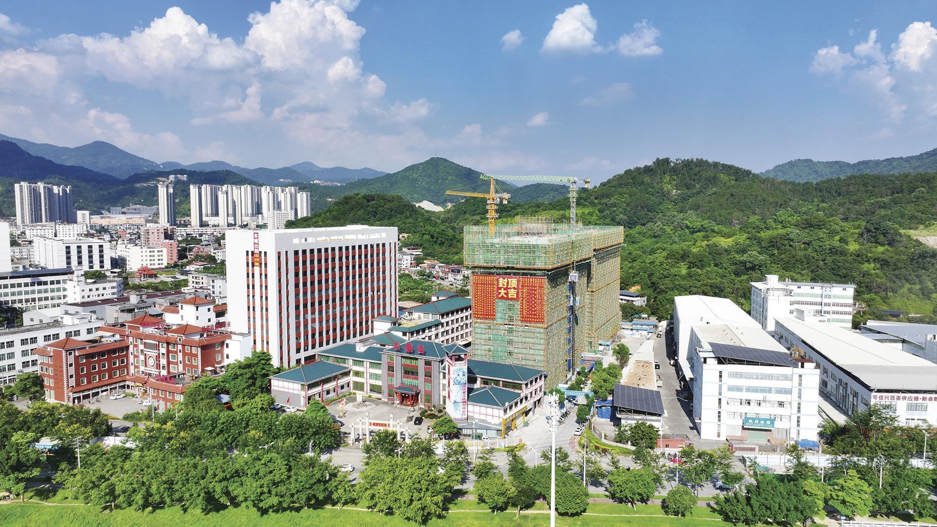 铁观音文化园国茶贸易中心提容扩建的3栋厂房主体结构已全部封顶